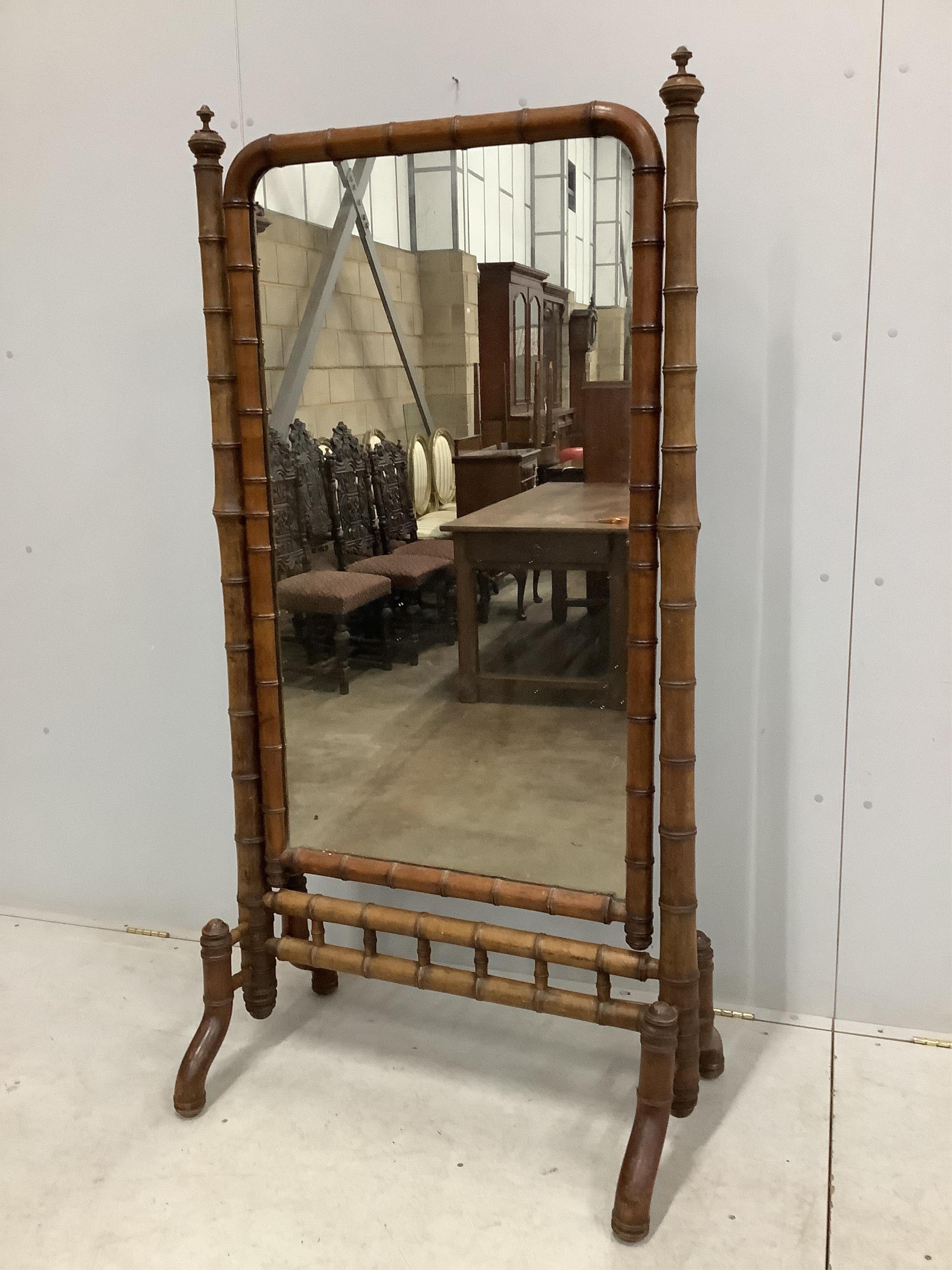 A 19th century French faux bamboo cheval mirror, width 87cm, height 170cm. Condition - fair